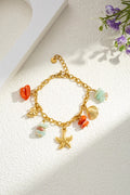 Coral charm armband - goud