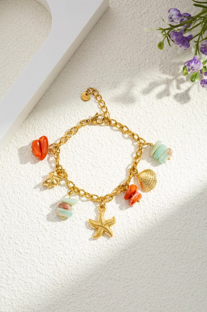 Coral charm armband - goud