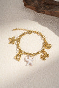 Ocean charm armband - goud