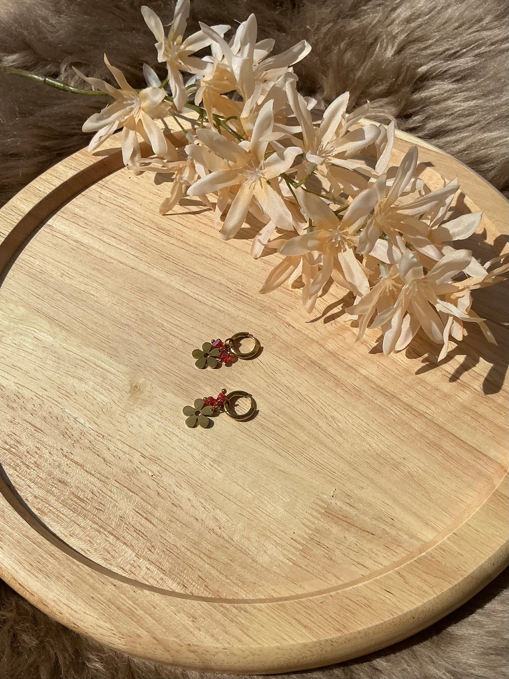Mini flower oorbellen - goud