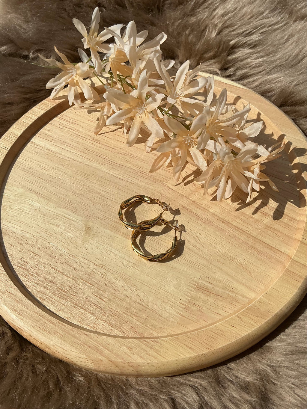 Twisted hoops - goud