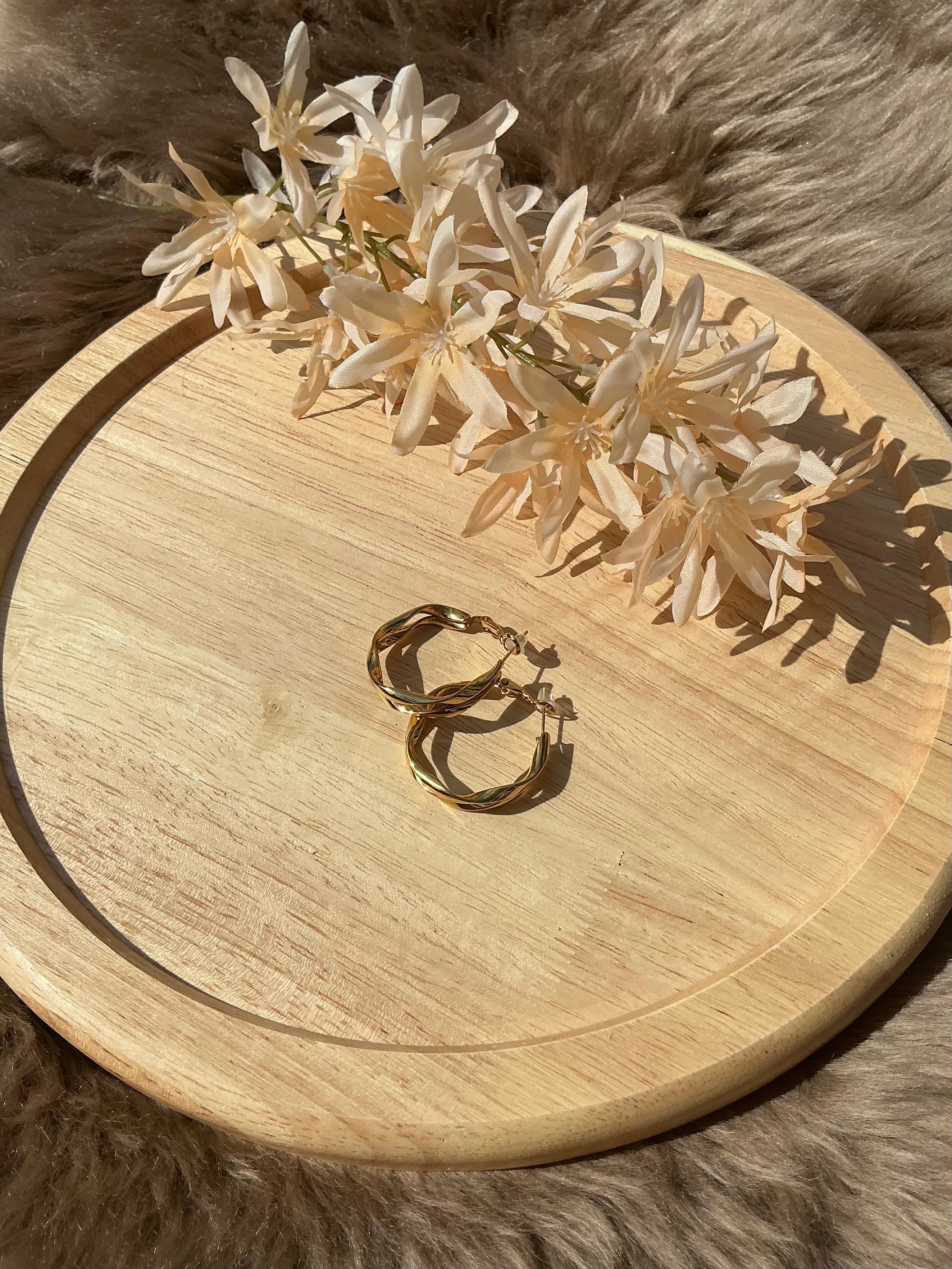 Twisted hoops - goud