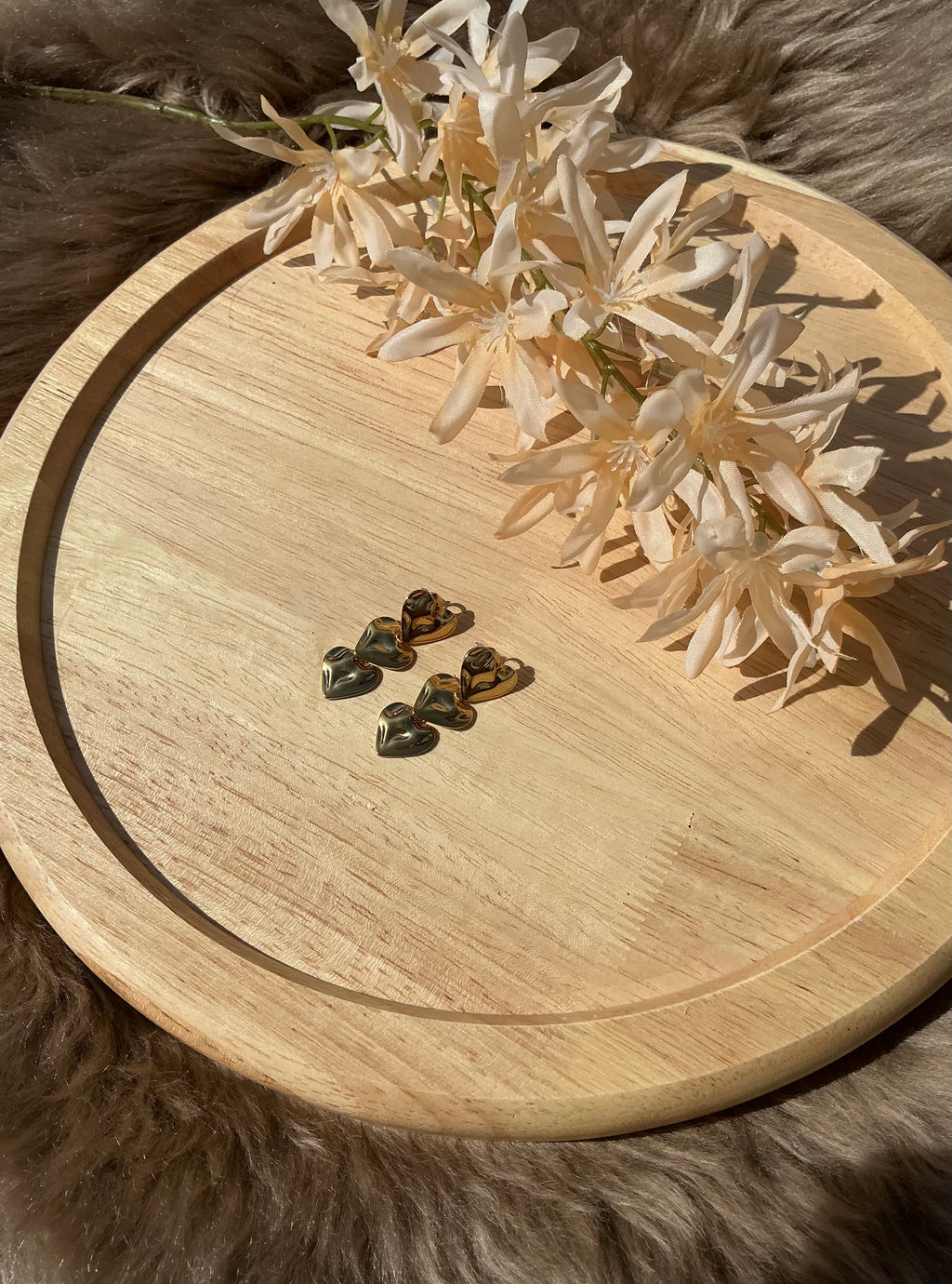 Triple heart oorbellen - goud