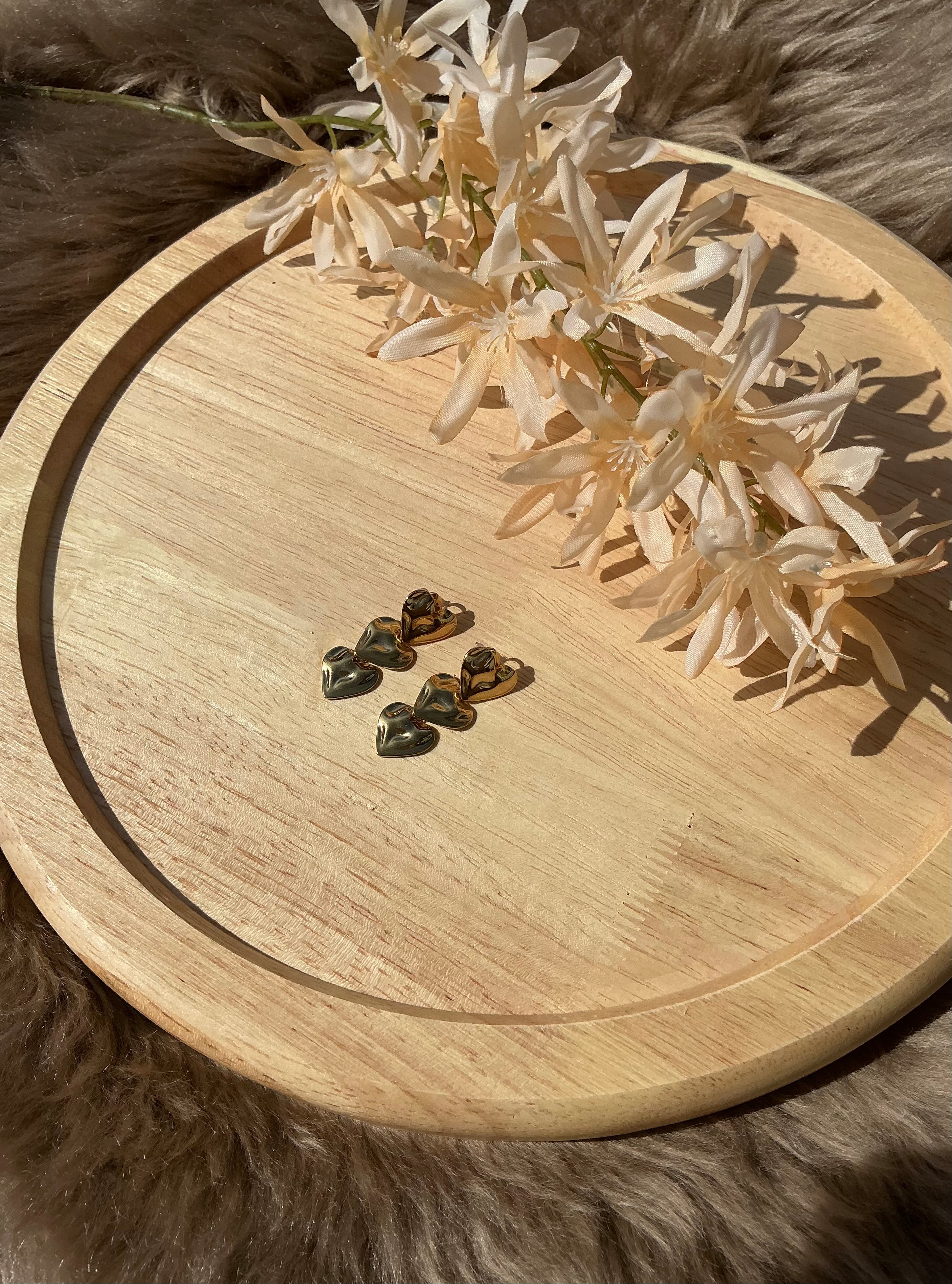 Triple heart oorbellen - goud
