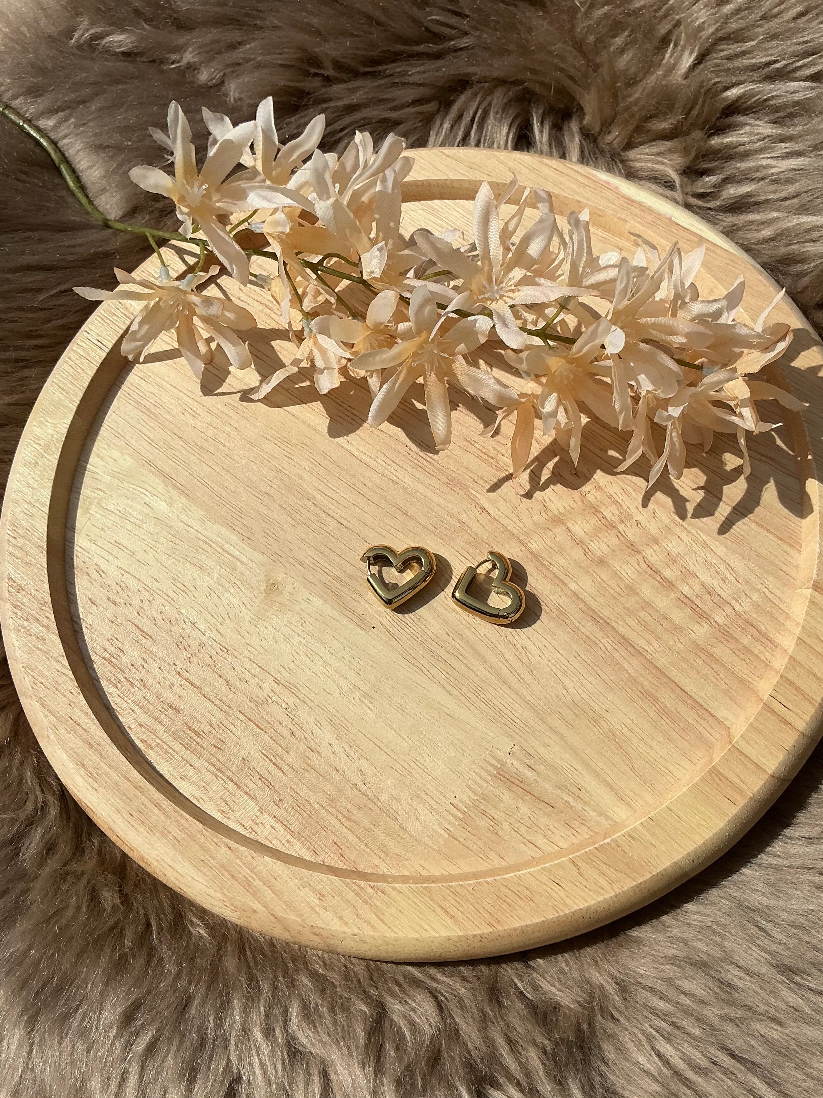 Heart shaped oorbellen - goud