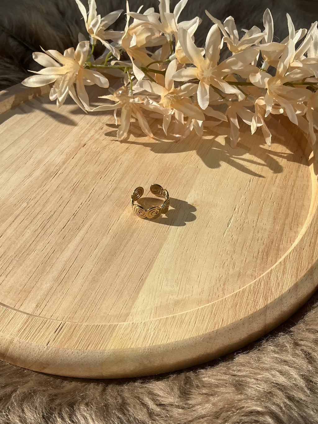 Twisted ring - goud